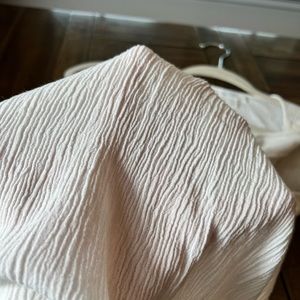 Tissue tank top with crochet front embellishment